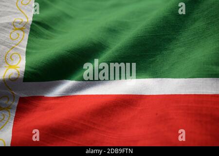 Primo piano della increspato Repubblica Cecena Bandiera, Repubblica Cecena bandiera soffiando nel vento Foto Stock