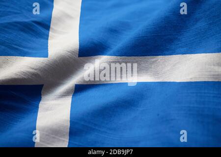 Closeup di Ruffled Shetland Flag, Shetland Flag soffiando in vento Foto Stock