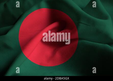 Increspato bandiera del Bangladesh soffiando nel vento Foto Stock