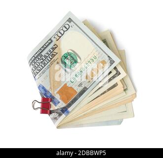 Carta USA denaro piegato a metà e isolato su uno sfondo bianco, concetto di stipendio, benefici Foto Stock