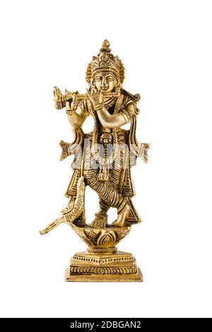 Krishna dio Vishnu avatar statua di ottone isolato su bianco con riflessione Foto Stock