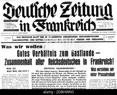 "L'immagine mostra una parte del frontespizio del primo numero del giornale NSDAP 'Deutsche Zeitung in Frankreich'' per i tedeschi residenti in Francia. ''il giornale tedesco dei tedeschi del Reich che vivono in Francia. Organo delle Società e Associazioni tedesche per le Notizie e la comunicazione''. Il 20 dicembre 1935, il titolo recita: 'Cosa vogliamo: ''buone relazioni con il paese ospitante - coesione di tutti i tedeschi che vivono in Francia?'. Foto Stock