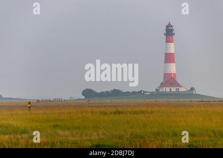 Faro Westerheversand in serata Foto Stock