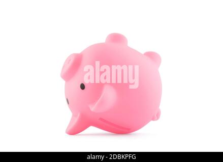 Banco di piggy rosa capovolto isolato su sfondo bianco con tracciato di ritaglio Foto Stock