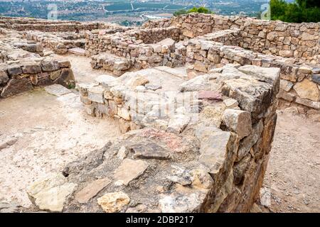 Resti di un'antica città iberica in una zona montagnosa di Olocau, Valencia Foto Stock