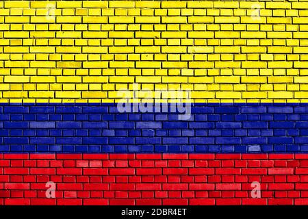 Bandiera della Colombia dipinta su un muro di mattoni Foto Stock