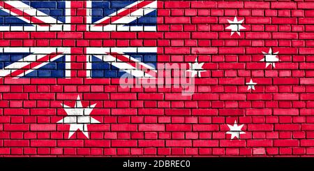 Bandiera civile di Australia dipinta su un muro di mattoni Foto Stock