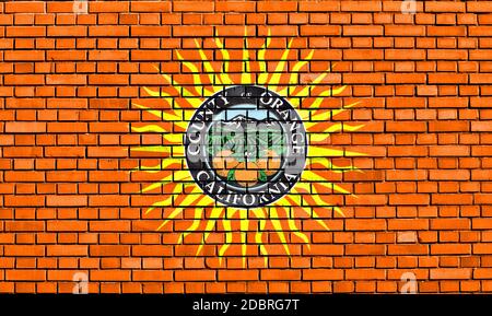 Bandiera della Contea di Orange dipinta su un muro di mattoni Foto Stock