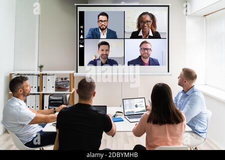 Online Video Conference Training Business Meeting in Office Foto Stock