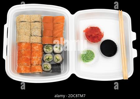 Quattro set di rotoli in capsule monouso su un nero sfondo Foto Stock