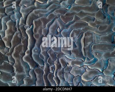 Sfondo astratto da una superficie in blu Foto Stock