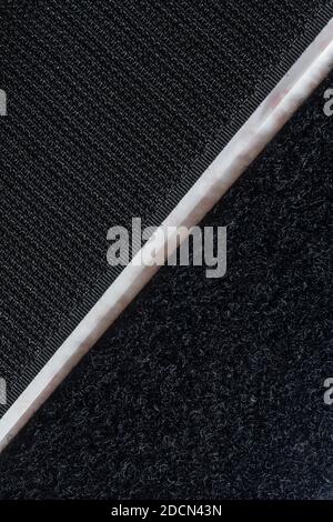 Velcro Stick su gancio e nastro autoadesivo ad anello che mostra le diverse superfici Foto Stock