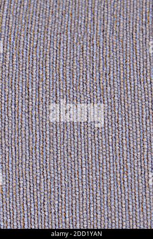 Fondo in tessuto grigio con linee lisce. Struttura di tessuto grossolano con cucitura in linea. Foto Stock