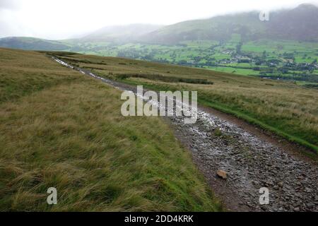 La Old Coach Road per Dockray a Matterdale via Hausewell Brow nel Lake District National Park, Cumbria, Inghilterra, Regno Unito. Foto Stock