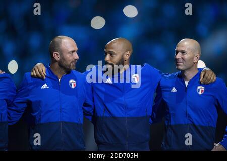 Christophe Dugarry, Thierry Henry, Zinedine Zidane durante una partita di calcio tra la nazionale francese della Coppa del mondo 1998 e la FIFA 98 composta da ex giocatori internazionali, in occasione del 20° anniversario della vittoria della Coppa del mondo 1998 in Francia, il 12 giugno 2018 all'U Arena di Nanterre, Vicino a Parigi. Foto di ELIOT BLONDT/ABACAPRESS.COM Foto Stock