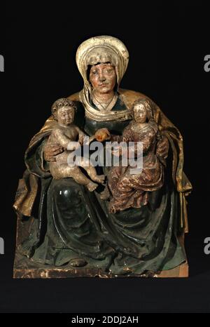 Sant'Anna con la Vergine e il Bambino, 1500-1550 Scuola tedesca, il tema di tre generazioni della Sacra Famiglia, nonna, madre e bambino, è stato popolare nel Nord Europa e soprattutto in Germania nel 15 ° e 16 ° secolo. Cristo è raffigurato come un bambino grumo con la sua mano sollevata nella benedizione. Il melograno detenuto dal bambino e dalla Vergine è un simbolo cristiano della risurrezione, per la sua classica associazione con Proserpina, figlia della dea del mais Ceres, che ogni primavera ritornò per rigenerare la terra. Ha anche associazioni con la castità della Vergine., legno Foto Stock