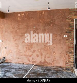 Intonacatura delle pareti, fondo marrone liscio Foto Stock