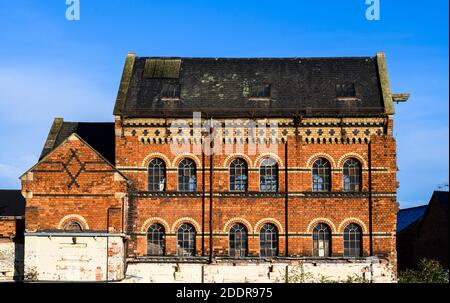 Fabbrica di derelict nella città di mercato di Market Harborough, Leicestershire, Inghilterra. Foto Stock