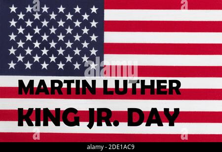 Happy Martin Luther King JR giorno sfondo con lettere e. Bandiera degli Stati Uniti Foto Stock