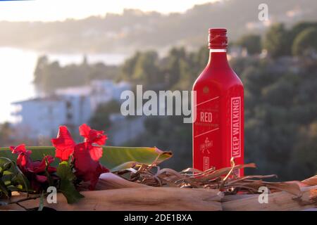 Johnnie Walker etichetta rossa. Divertimento al tramonto Foto Stock