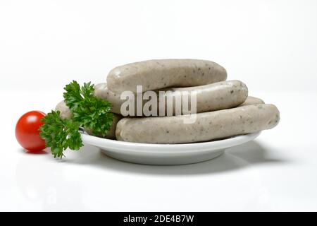 Nuremberger Rostbratwurst su un piatto, grezzo, Germania Foto Stock