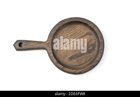 Tagliere rotondo con manico a forma di padella. Foto Stock