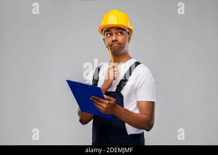 pensare costruttore con appunti e matita Foto Stock