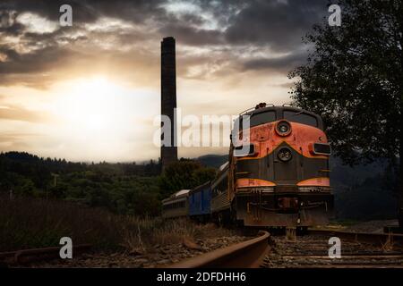 Treno vecchio Rusty sulle piste ferroviarie Foto Stock