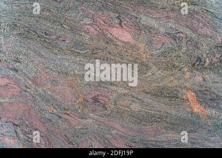 Marmo sgranato scuro con motivi ondulati multicolore. Texture e sfondo di alta qualità per i tuoi progetti e il tuo lavoro creativo Foto Stock