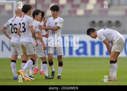 Doha, Qatar. 7 Dic 2020. I giocatori del SIPG FC di Shanghai reagiscono dopo la partita del round 16 della AFC Champions League tra la Shanghai SIPG FC della Cina e Vissel Kobe del Giappone a Doha, Qatar, 7 dicembre 2020. Credit: Nikku/Xinhua/Alamy Live News Foto Stock