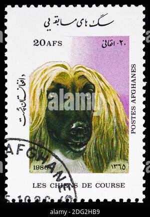 MOSCA, RUSSIA - 10 NOVEMBRE 2018: Un francobollo stampato in Afghanistan mostra Afghan Hound (Canis lupus familiaris), Pedigree Dogs serie, circa 1986 Foto Stock