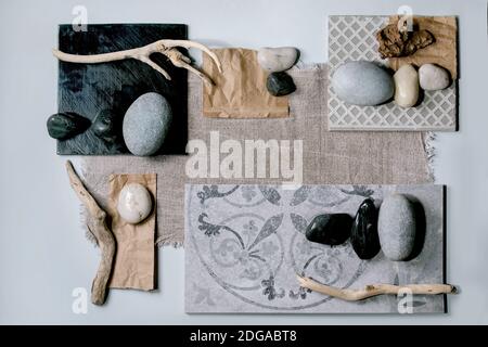 Layout creativo geometria astratta piazze per natura materiali carta, tessuto, ceramica con pietre e rami asciutti. Disposizione piatta. Spazio per qualsiasi prodotto. Foto Stock