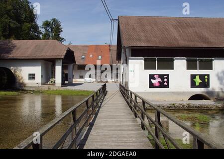 Technical Museum of Slovenia 20 km from Ljubljana in Bistra.  Bridge to buildings and old agricultural implements. Slovenia, Bistra, September Foto Stock