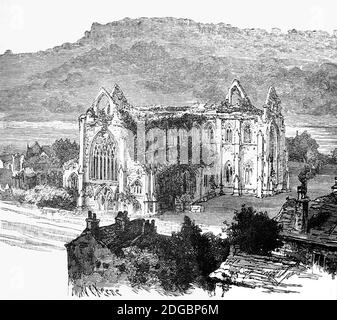 Una vista aerea tardo 19 ° secolo dell'Abbazia di Tintern, fondata nel 1131 da Walter de Clare, Signore di Chepstow. E' situato adiacente al villaggio di Tintern nel Monmouthshire, sulla riva gallese del fiume Wye al confine tra Galles e Inghilterra. Fu la prima fondazione cistercense in Galles, ma cadde in rovina dopo lo scioglimento dei monasteri nel XVI secolo. I suoi resti, tuttavia, sono stati celebrati in poesia e pittura dal 18 ° secolo in poi. Foto Stock