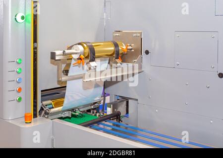 Macchina per la stampa a goffratura di lettere con lamina d'oro a caldo commerciale Foto Stock