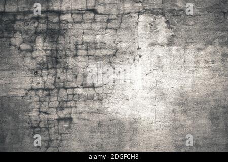Immagine di sfondo: un frammento di un vecchio muro di pietra. Foto Stock