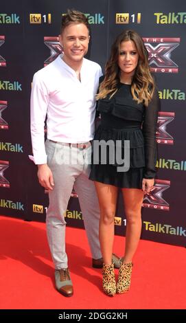 Olly Murs e Caroline Flack arrivano al lancio stampa e la proiezione del primo episodio di X Factor 2011, Cineworld, O2 Arena, Greenwich, Londra. Foto Stock