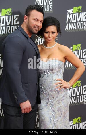 Jenni Farley e Roger Matthews in arrivo ai MTV Movie Awards 2013, Sony Pictures Studios, Culver City, Los Angeles. Foto Stock