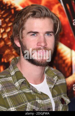 Liam Hemsworth partecipa ai Giochi della fame: Mockingjay parte 1 fotocellula, Corinthia Hotel, Londra. Foto Stock