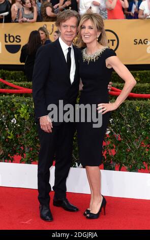 Felicity Huffman e William H. Macy arrivano sul tappeto rosso al 21° Annual Screen Actors Guild Awards, tenutosi presso il Shrine Auditorium di Los Angeles. Foto Stock