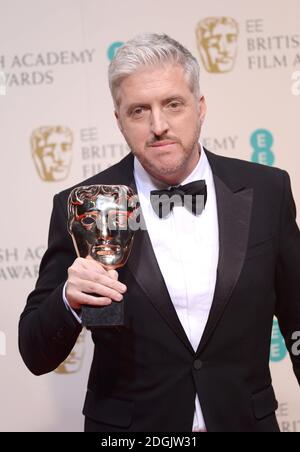 Anthony McCarten, vincitore del premio miglior sceneggiatura adattata per il film 'la Teoria di tutto' nella Sala Stampa all'EE British Academy Film Awards 2015 che si è tenuto alla Royal Opera House di Covent Garden, Londra UK. Foto Stock