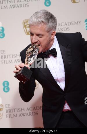 Anthony McCarten, vincitore del premio miglior sceneggiatura adattata per il film 'la Teoria di tutto' nella Sala Stampa all'EE British Academy Film Awards 2015 che si è tenuto alla Royal Opera House di Covent Garden, Londra UK. Foto Stock