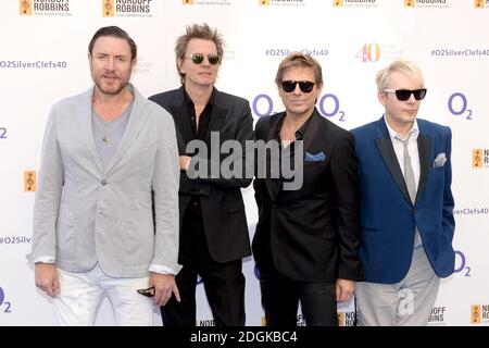 Simon le Bon, John Taylor, Roger Taylor e Nick Rhodes di Duran Duran partecipano al Nordoff Robbins O2 Silver Clef Awards 2015, tenutosi al Grosvenor House Hotel, Park Lane, Londra. (Credito obbligatorio: DOUG PETERS/EMPICS Entertainment) Foto Stock