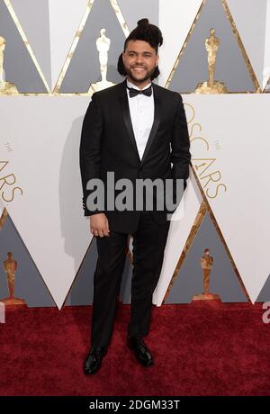 Il Weeknd arriva all'ottantottesimo Academy Awards tenutosi al Dolby Theatre di Hollywood, Los Angeles, CA, USA, 28 febbraio 2016. Foto Stock