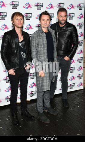 Dominic Howard, Matt Bellamy e Chris Wolstenholme di Muse hanno partecipato ai VO5 NME Awards 2018 che si sono tenuti alla O2 Brixton Academy di Londra Foto Stock