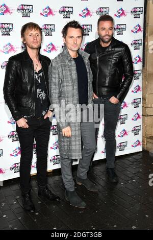 Dominic Howard, Matt Bellamy e Chris Wolstenholme di Muse hanno partecipato ai VO5 NME Awards 2018 che si sono tenuti alla O2 Brixton Academy di Londra Foto Stock