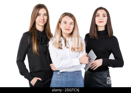 United Team of Business Women. Ritratto team di tre uomini d'affari sorridenti isolati su sfondo bianco. Donne d'affari standi Foto Stock
