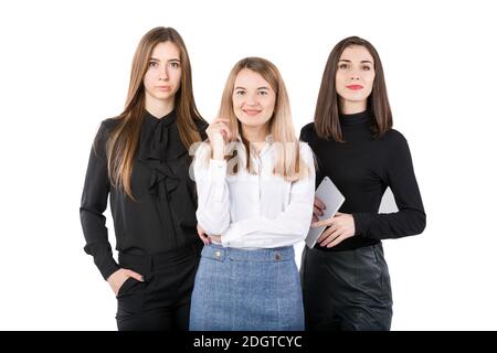 United Team of Business Women. Ritratto team di tre uomini d'affari sorridenti isolati su sfondo bianco. Donne d'affari standi Foto Stock