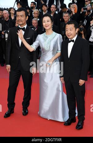 Fan Liao, Tao Zhao e Zhangke Jia che partecipano alla prima Eternals (la cenere è bianco puro) come parte del 71esimo Festival del Cinema di Cannes Foto Stock