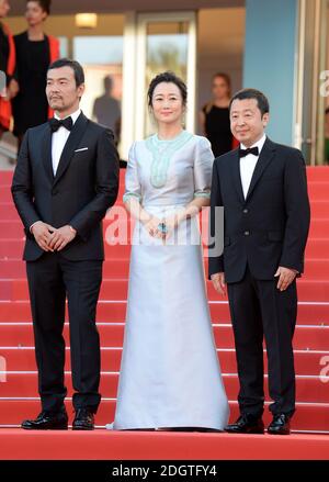 Fan Liao, Tao Zhao e Zhangke Jia che partecipano alla prima Eternals (la cenere è bianco puro) come parte del 71esimo Festival del Cinema di Cannes Foto Stock